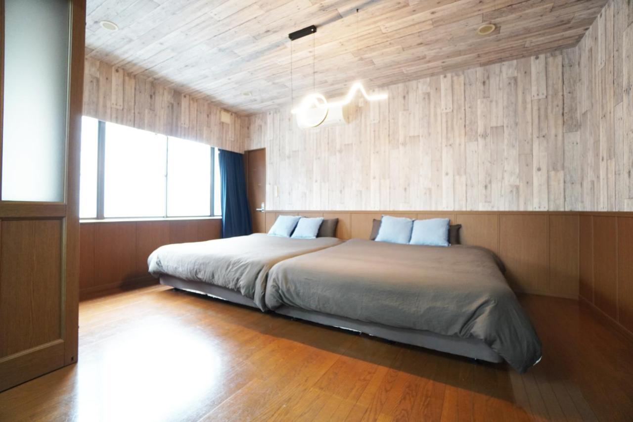 Apartamento Tsurigane Building H-4 Osaka Exterior foto
