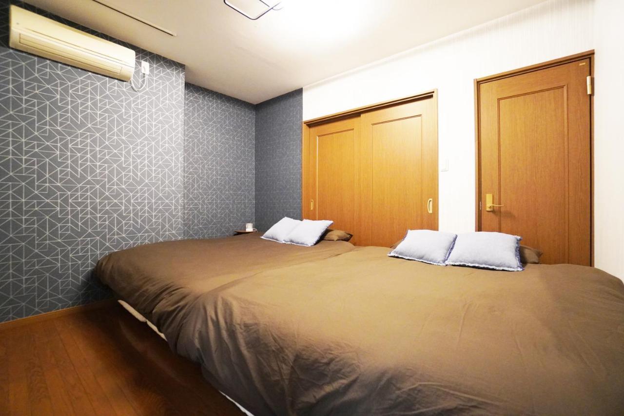 Apartamento Tsurigane Building H-4 Osaka Exterior foto