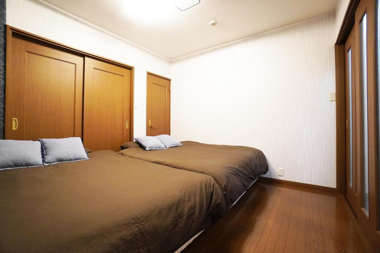 Apartamento Tsurigane Building H-4 Osaka Exterior foto